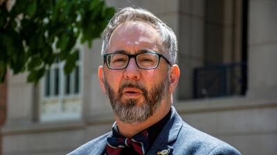 Mike Haines, the brother of murdered aid worker David Haines, speaks to the news media. Reuters