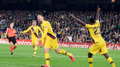 Clement Lenglet of Barcelona celebrates after scoring his team's third goal against Real Betis on Sunday. Getty Images