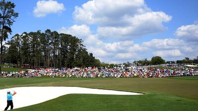 Fred Couples of the US plays a shot out of a bunker on the second hole during the final round of the 78th Masters Golf Tournament at Augusta National Golf Club on April 13, 2014 in Augusta, Georgia. AFP PHOTO/Jim WATSON
