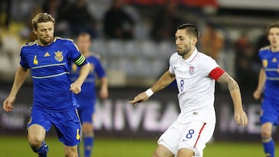 Clint Dempsey and USA lost to Ukraine 2-0. They'll play in Group G at the 2014 World Cup with Germany, Portugal and Ghana. Katia Christodoulou / EPA