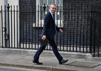 Conservative Member of Parliament Michael Gove arrives for a cabinet re-shuffle. EPA