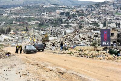 People inspect the damage in the southern Lebanese village of Kfar Kila near the border with Israel on February 19. AFP