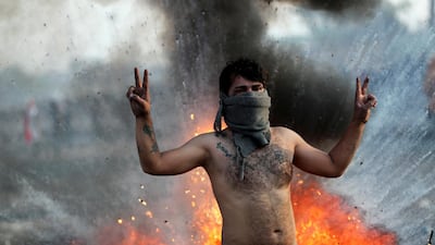 An Iraqi demonstrator gestures during ongoing anti-government protests in Baghdad. REUTERS