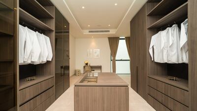 A sizeable walk-in wardrobe and dressing area in the master suite. Courtesy Allsopp and Allsopp