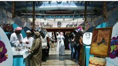 Young would-be entrepreneurs have set up stalls at Marina Mall in Abu Dhabi to sell their ideas and products. Lee Hoagland / The National