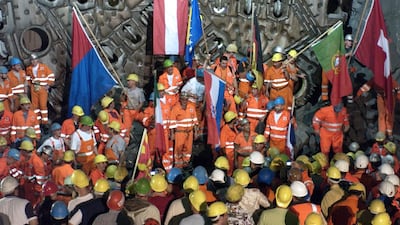 Miners celebrate a breakthrough in the NEAT Gotthard base tunnel in Faido, Switzerland, in September, 2006. Karl Mathis / Keystone via AP