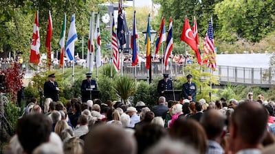 People attend the 10th anniversary memorial service for the 2011 Christchurch earthquake. AP Photo