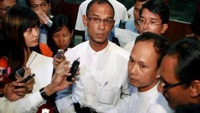 Mya Aye, a member of the 88 Generation Students Group, talks to journalists at Yangon airport in February, 2012.