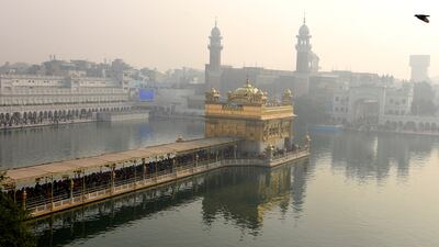 Police are checking surveillance cameras at the temple to find out where the man came from and the identities of those involved in Saturday's lynching.