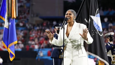 Singer and songwriter Jazmine Sullivan gave an emotional rendition of the US national anthem. AP Photo