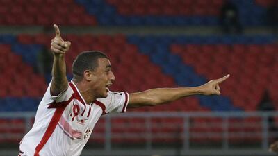 Tunisia's Ahmed Akaichi celebrates after scoring in his side's 1-1 draw with DR Congo in the Africa Cup of Nations on Monday as they advanced to the quarter-finals. Themba Hadebe / AP / January 26, 2015
