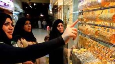 Kuwaitis are having to tighten their belts as the global fiscal crisis is felt in the kingdom.