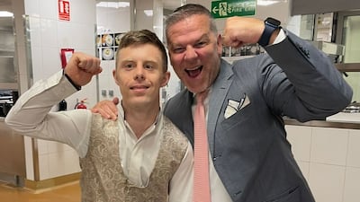 Vincent Baur, pictured with Alessandro Redaelli, general manager of Conrad Abu Dhabi's Etihad Towers, works in the in-room-dining department. Photo: Hilton