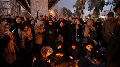 Iranians light candles for victims of Ukraine International Airlines Boeing 737-800 as they protest in front of the Amir Kabir University in Tehran, Iran. EPA