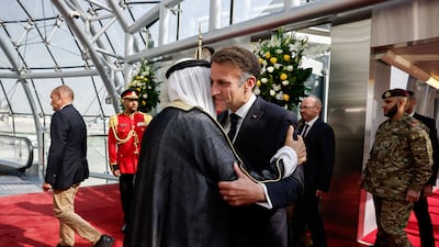 Sheikh Meshal, Emir of Kuwait, welcomes French President Emmanuel Macron at Kuwait International Airport. Reuters