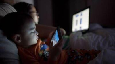 Gadgets might keep children quiet but for every hour of television they watch, they are 8 per cent less likely to eat fruit every day. Allen Donikowski / Getty Images