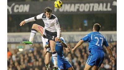 Tottenham's Gareth Bale outjumps Newcastle's Steven Taylor at White Hart Lane, London, on Tuesday.