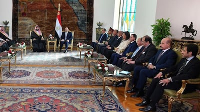 Mohammed bin Salman, centre left, meets with Egyptian President Abdel-Fattah El Sisi in Cairo. Egyptian Presidency via AP