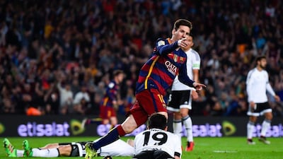 Lionel Messi of FC Barcelona celebrates after scoring his team’s first goal during the La Liga match between FC Barcelona and Valencia CF at Camp Nou on April 17, 2016 in Barcelona, Spain. (Photo by David Ramos/Getty Images)