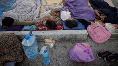 Displaced Lebanese children sleep in a car park in central Beirut. Reuters
