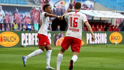 Leipzig defender Lukas Klostermann, right, celebrates after his goal. AFP