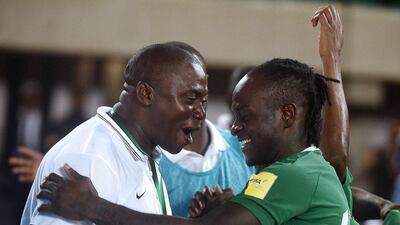 Nigeria's forward Victor Moses, right, celebrates after scoring against Algeria in their 2018 World Cup qualifying match at the Akwa Ibom State Stadium in Uyo on November 12, 2016. Utomi Ekpei / AFP