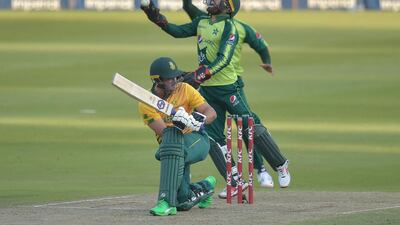 Pakistan's Mohammad Rizwan celebrates after taking a catch of South Africa's Pite van Biljon during the second T20 in Johannesburg. AFP