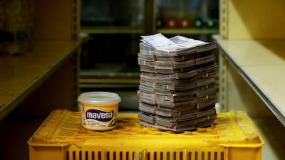 A container of margarine is pictured next to 3,000,000 bolivars