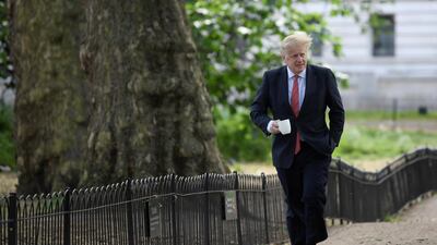 Boris Johnson goes for a walk in Central London, May 11. Toby Melville/ Reuters
