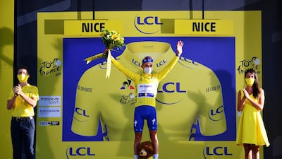 Julian Alaphilippe wearing the overall leader's yellow jersey. Reuters
