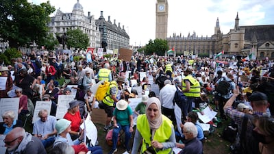 People take part in a Lift the Ban on Palestine Action protest. PA