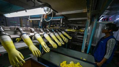 An employee at the DPL Premier gloves factory in Sri Lanka's Free Trade Zone in Biyagama. AFP