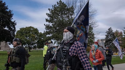 Far-right group the Boogaloo Boys hold a rally at the Capitol Building in Lansing, Michigan. AFP