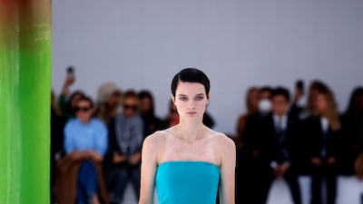 Velvet dresses arrived in strange shapes, like a suit jacket had been sewn on to the front, at Loewe spring/summer 2023. Getty