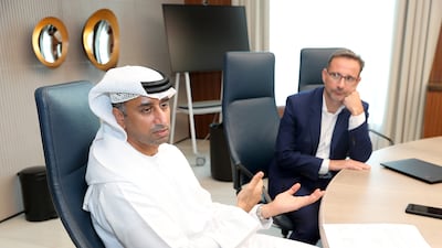 Fahad Al Hassawi, chief executive of du, and Nicolas Levi, chief executive of du Pay, during the launch of the new platform on Monday. Pawan Singh / The National