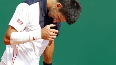 Novak Djokovic reacts during his semi-final match against Roger Federer at April's Monte Carlo Masters. Sebastien Nogier / EPA / April 19, 2014