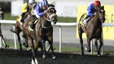 Soft Falling Rain, centre, ran into some good form after Mike de Kock's horse won at Meydan Racecourse on Thursday night. Mike Young / The National