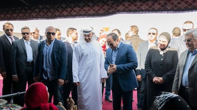 Sheikh Mohamed bin Zayed, Crown Prince of Abu Dhabi and Deputy Supreme Commander of the Armed Forces, and President Abdel Fattah El Sisi of Egypt peruse some of the handicrafts on display at Sharm El Sheikh Hertiage Festival on Wednesday. Courtesy Sheikh Mohamed bin Zayed Twitter