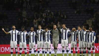 FC Porto players observe a minute of silence in honour of the Chapecoense players prior to the Portuguese League Cup match against Belenenses. Estela Silva / EPA