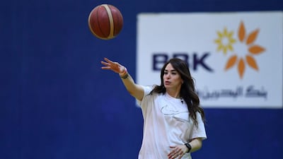 Reyadh thinks of herself like 'just any other basketball coach ― I believe in myself'.