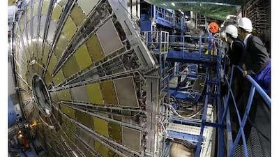 Spectators look at the Atlas detector designed to measure the broadest possible range of particles within the Large Hadron Collider at the Centre Europeen de Recherche Nucleaire (Cern) near Geneva, Switzerland.
