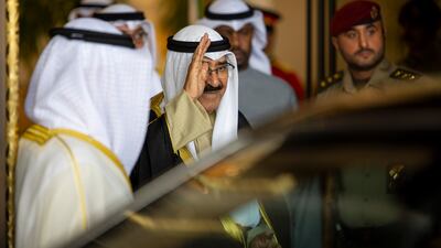 Sheikh Meshal bids farewell to Sheikh Mohamed after the reception at Bayan Palace