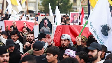 Mourners carry the coffin of Saad Al Baiji, the Popular Mobilisation Forces' Anbar operations commander. Reuters
