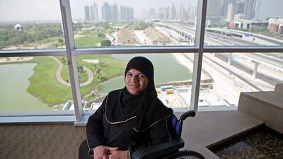 Nada al Bustani at Dubai Bank in the Emaar Business Park, Dubai, where she works. "People have to stop and look at priorities," says Nada.