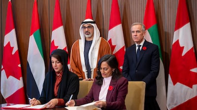 Sheikh Khaled and Mr Carney with Ms Al Hashimy and Anita Anand, Canada's Minister of Foreign Affairs.