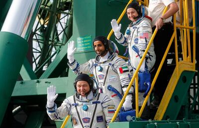 Astronaut Maj Hazza Al Mansouri, centre, Russian cosmonaut Oleg Skripochka, bottom, and US astronaut Jessica Meir, top, board the Soyuz MS-15 spacecraft for the launch on September 25, 2019. AP