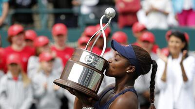 Sloane Stephens kisses the trophy after defeating Elena Vesnina in the WTA Charleston final on Sunday. Mic Smith / AP / April 10, 2016