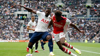 Arsenal's Nuno Tavares in action with Tottenham Hotspur's Serge Aurier.