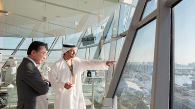 Sheikh Abdullah bin Zayed. Minister of Foreign Affairs, right, speaks with Lee Myung-bak, former President of the Republic of Korea, left, during the final race of the 2014 Formula 1 Etihad Airways Abu Dhabi Grand Prix at Yas Marina Circuit. Mohamed Al Hammadi / Crown Prince Court — Abu Dhabi