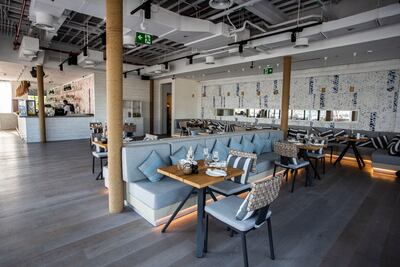 The interior is flooded with natural light. Photo: Cove Beach Abu Dhabi